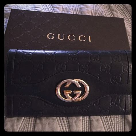 black and gold gucci wallet|vintage Gucci wallet black.